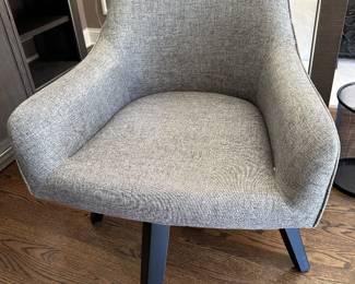 (2) Crate & Barrel swivel chairs (one sold as is with slight tear) - $300 and $200