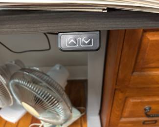 Adjustable desk controls