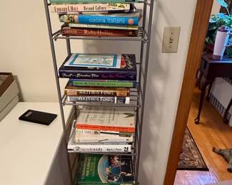 Assorted Books Collection on Metal Shelving Unit