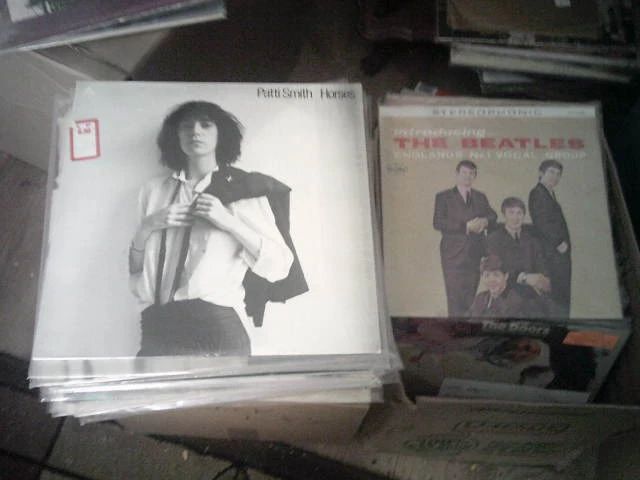 Over 1,000 vinyl L.P's originals featuring many rock classics like David Bowie, punk with Patti Smith , country Dolly Parton, and Jazz with Miles Davis.
