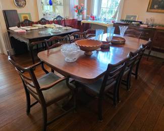 Beautiful Antique Dinning Table with 8 chairs.