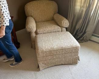 Upholstered comfortable chair with ottoman