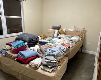 Queen bed, twin bed, linens galore