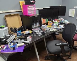 Wide range of office supplies including Computer monitors Staplers Sticky notes Clipboards And two line Cordless phone set