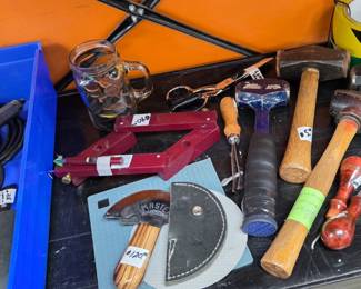Various Leather working tools Including round knife handheld brander Self-Center strap punch A different kinds of mallets and Different kinds Of mallets And punches