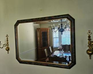 Large blue and gold mirror and gold sconces