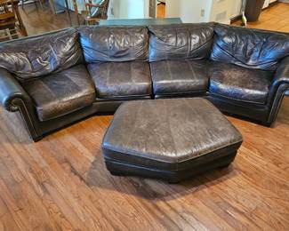 Large leather couch and ottoman