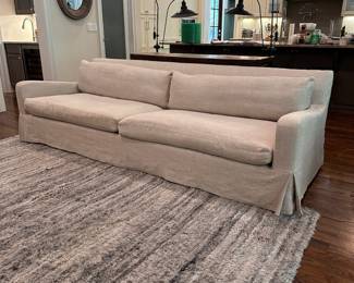 F5 - $2600. Restoration Hardware Belgian Slope Arm, 2 cushion Sofa. . Down filled cushions. Linen slipcover. Measures 9' long x 42" deep x 31" tall.