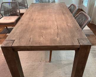 F35 - $1200. TABLE ONLY. (Chairs are priced separately.) Restoration Hardware Reclaimed Oak Parsons Rectangular Dining Table featuring thick, block legs and a rustic driftwood finish. Natural Oak Finish. Measures 39.5" wide x 7' long x 30" tall. Weighs 224#. Also has 2 - 24" leaves that attach to the ends of the table.