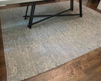 F4 - $150. Blue Area Rug under Dining Table. Measures 8' x 10'. Has a few minor pulls - overall very good condition.