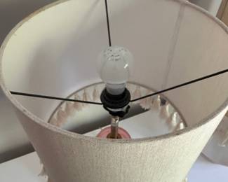 F56 - $25 Each. Pink Lamps - 2 available. Same style but slightly different colors. Measures 22.5" tall. Shades are both in good condition. Lamp bases are glass and are open on the bottom.