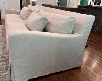 F5 - $2600. Restoration Hardware Belgian Slope Arm, 2 cushion Sofa. . Down filled cushions. Linen slipcover. Measures 9' long x 42" deep x 31" tall.