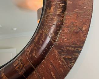 F20 - $100. Pottery Barn "Bark Wrapped" Wood Framed Mirror. Measures 32.5" round.