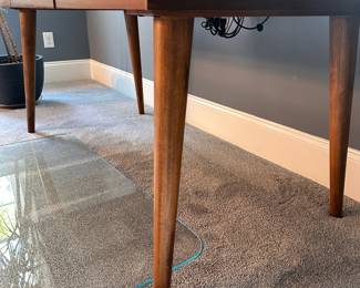 F55 - $650. Crate & Barrel "Tate" Desk. Measures 5' long x 30" deep x 30" tall. Solid Walnut & Walnut Veneer. Integrated Power Strip with 2 USBs and 2 - 3 prong outlets. Still on website. Excellent condition!