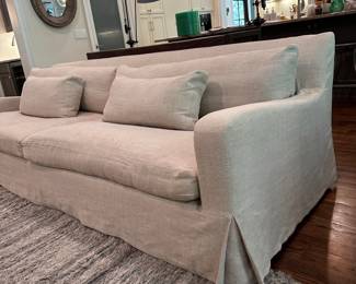 F5 - $2600. Restoration Hardware Belgian Slope Arm, 2 cushion Sofa. . Down filled cushions. Linen slipcover. Measures 9' long x 42" deep x 31" tall.