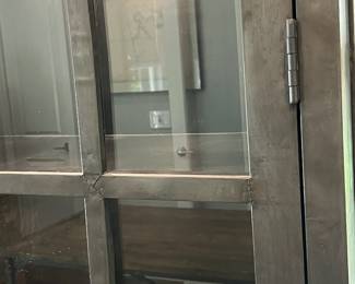 F22 - $1600. Restoration Hardware - Annecy Metal Wrapped Glass 4-Door Cabinet. Lighted. (Retail was $3,452). This is HEAVY and the movers have put it in the garage for ease of loading. You will need 2 very strong people to load this. Restoration Hardware - Annecy Metal Wrapped Glass 4-Door Cabinet. (Retail was $3,452). This is HEAVY and the movers have put it in the garage for ease of loading. You will need 2 very strong people to load this. Measures 84.25" x 18.25" deep x 93" tall. Zinc Finish.