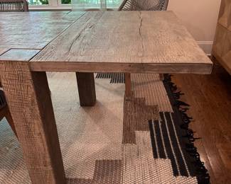F35 - $1200. TABLE ONLY. (Chairs are priced separately.) Restoration Hardware Reclaimed Oak Parsons Rectangular Dining Table featuring thick, block legs and a rustic driftwood finish. Natural Oak Finish. Measures 39.5" wide x 7' long x 30" tall. Weighs 224#. Also has 2 - 24" leaves that attach to the ends of the table.