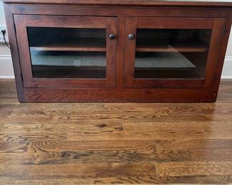 F17 - $75. TV Console. Measures 50" x 17.75" x 24.5" tall.