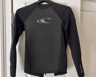 F52 - $25. O'Neill Style #4394. Long sleeve wetsuit top. Size Medium.