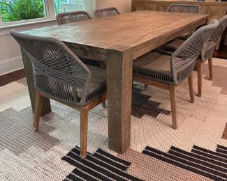 F35 - $1200. TABLE ONLY. (Chairs are priced separately.) Restoration Hardware Reclaimed Oak Parsons Rectangular Dining Table featuring thick, block legs and a rustic driftwood finish. Natural Oak Finish. Measures 39.5" wide x 7' long x 30" tall. Weighs 224#. Also has 2 - 24" leaves that attach to the ends of the table.