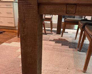 F35 - $1200. TABLE ONLY. (Chairs are priced separately.) Restoration Hardware Reclaimed Oak Parsons Rectangular Dining Table featuring thick, block legs and a rustic driftwood finish. Natural Oak Finish. Measures 39.5" wide x 7' long x 30" tall. Weighs 224#. Also has 2 - 24" leaves that attach to the ends of the table.