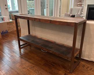 F32 - $125. Metal & Reclaimed Wood Console Table. "Avila Console Table". Measures 5' x 16" x 33.5" tall. Purchased at a furniture market.