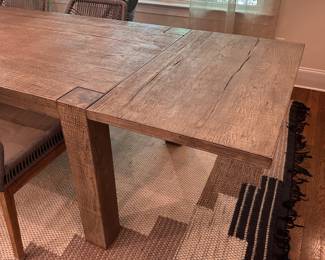 F35 - $1200. TABLE ONLY. (Chairs are priced separately.) Restoration Hardware Reclaimed Oak Parsons Rectangular Dining Table featuring thick, block legs and a rustic driftwood finish. Natural Oak Finish. Measures 39.5" wide x 7' long x 30" tall. Weighs 224#. Also has 2 - 24" leaves that attach to the ends of the table.