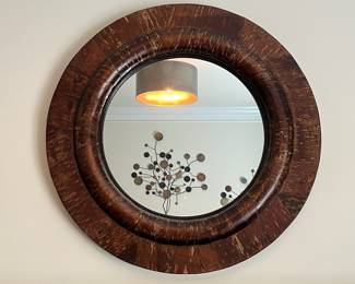 F20 - $100. Pottery Barn "Bark Wrapped" Wood Framed Mirror. Measures 32.5" round.