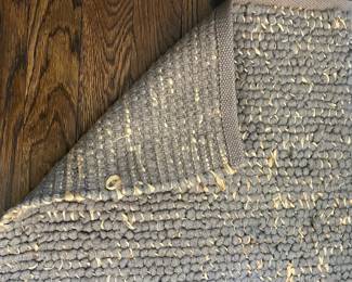 F4 - $150. Blue Area Rug under Dining Table. Measures 8' x 10'. Has a few minor pulls - overall very good condition.