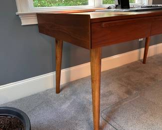F55 - $650. Crate & Barrel "Tate" Desk. Measures 5' long x 30" deep x 30" tall. Solid Walnut & Walnut Veneer. Integrated Power Strip with 2 USBs and 2 - 3 prong outlets. Still on website. Excellent condition!
