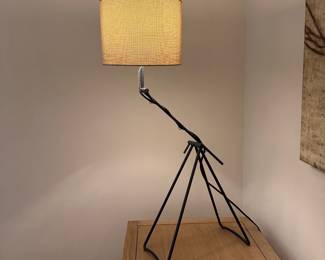 F39 - $75. Adjustable Table Lamp. Base is 22" wide. Lamp adjusts from 32" - 35" at the tallest.