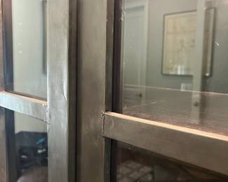 F22 - $1600. Restoration Hardware - Annecy Metal Wrapped Glass 4-Door Cabinet. Lighted. (Retail was $3,452). This is HEAVY and the movers have put it in the garage for ease of loading. You will need 2 very strong people to load this. Restoration Hardware - Annecy Metal Wrapped Glass 4-Door Cabinet. (Retail was $3,452). This is HEAVY and the movers have put it in the garage for ease of loading. You will need 2 very strong people to load this. Measures 84.25" x 18.25" deep x 93" tall. Zinc Finish.