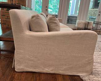 F5 - $2600. Restoration Hardware Belgian Slope Arm, 2 cushion Sofa. . Down filled cushions. Linen slipcover. Measures 9' long x 42" deep x 31" tall.