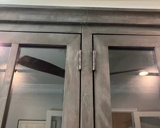 F22 - $1600. Restoration Hardware - Annecy Metal Wrapped Glass 4-Door Cabinet. Lighted. (Retail was $3,452). This is HEAVY and the movers have put it in the garage for ease of loading. You will need 2 very strong people to load this. Restoration Hardware - Annecy Metal Wrapped Glass 4-Door Cabinet. (Retail was $3,452). This is HEAVY and the movers have put it in the garage for ease of loading. You will need 2 very strong people to load this. Measures 84.25" x 18.25" deep x 93" tall. Zinc Finish.