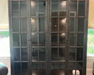 F22 - $1600. Restoration Hardware - Annecy Metal Wrapped Glass 4-Door Cabinet. Lighted. (Retail was $3,452). This is HEAVY and the movers have put it in the garage for ease of loading. You will need 2 very strong people to load this. Restoration Hardware - Annecy Metal Wrapped Glass 4-Door Cabinet. (Retail was $3,452). This is HEAVY and the movers have put it in the garage for ease of loading. You will need 2 very strong people to load this. Measures 84.25" x 18.25" deep x 93" tall. Zinc Finish.