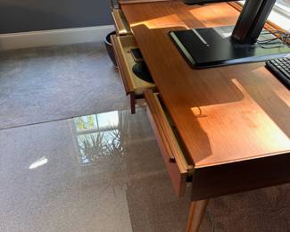 F55 - $650. Crate & Barrel "Tate" Desk. Measures 5' long x 30" deep x 30" tall. Solid Walnut & Walnut Veneer. Integrated Power Strip with 2 USBs and 2 - 3 prong outlets. Still on website. Excellent condition!