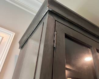 F22 - $1600. Restoration Hardware - Annecy Metal Wrapped Glass 4-Door Cabinet. Lighted. (Retail was $3,452). This is HEAVY and the movers have put it in the garage for ease of loading. You will need 2 very strong people to load this. Restoration Hardware - Annecy Metal Wrapped Glass 4-Door Cabinet. (Retail was $3,452). This is HEAVY and the movers have put it in the garage for ease of loading. You will need 2 very strong people to load this. Measures 84.25" x 18.25" deep x 93" tall. Zinc Finish.