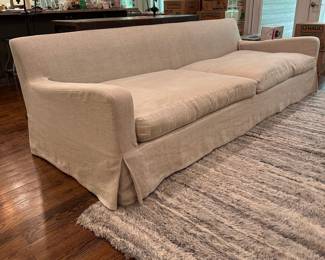 F5 - $2600. Restoration Hardware Belgian Slope Arm, 2 cushion Sofa. . Down filled cushions. Linen slipcover. Measures 9' long x 42" deep x 31" tall.