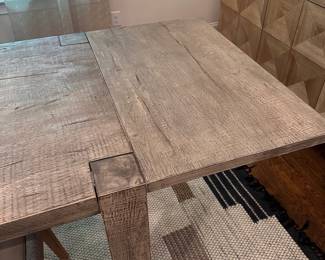 F35 - $1200. TABLE ONLY. (Chairs are priced separately.) Restoration Hardware Reclaimed Oak Parsons Rectangular Dining Table featuring thick, block legs and a rustic driftwood finish. Natural Oak Finish. Measures 39.5" wide x 7' long x 30" tall. Weighs 224#. Also has 2 - 24" leaves that attach to the ends of the table.