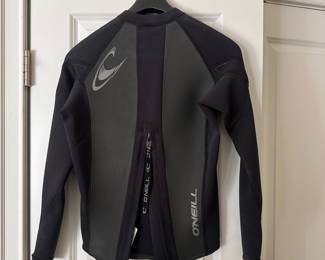 F52 - $25. O'Neill Style #4394. Long sleeve wetsuit top. Size Medium.