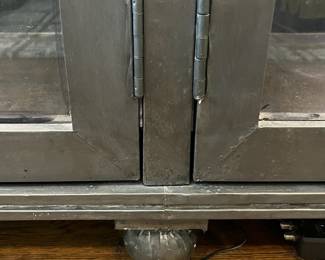 F22 - $1600. Restoration Hardware - Annecy Metal Wrapped Glass 4-Door Cabinet. Lighted. (Retail was $3,452). This is HEAVY and the movers have put it in the garage for ease of loading. You will need 2 very strong people to load this. Restoration Hardware - Annecy Metal Wrapped Glass 4-Door Cabinet. (Retail was $3,452). This is HEAVY and the movers have put it in the garage for ease of loading. You will need 2 very strong people to load this. Measures 84.25" x 18.25" deep x 93" tall. Zinc Finish.