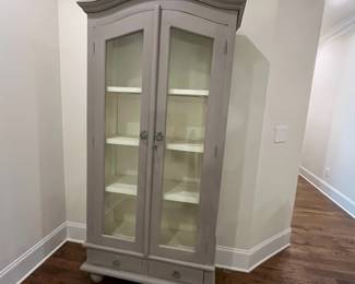 F26 - $250. Grey Display Cabinet with wooden shelves. Measures 38" wide x 15.25" deep x 79" tall.