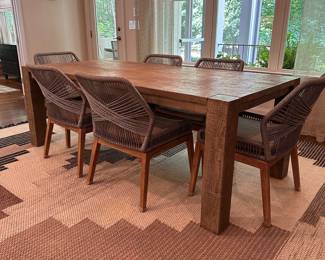 F35 - $1200. TABLE ONLY. (Chairs are priced separately.) Restoration Hardware Reclaimed Oak Parsons Rectangular Dining Table featuring thick, block legs and a rustic driftwood finish. Natural Oak Finish. Measures 39.5" wide x 7' long x 30" tall. Weighs 224#. Also has 2 - 24" leaves that attach to the ends of the table.
