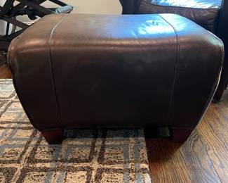 F24 - $400. Pottery Barn by Mitchell Gold Leather Chair & Ottoman. Measures 36" x 33.5" x 34" tall. Ottoman 25" x 20.5" x 14.75" tall.