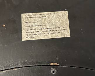 F20 - $100. Pottery Barn "Bark Wrapped" Wood Framed Mirror. Measures 32.5" round.