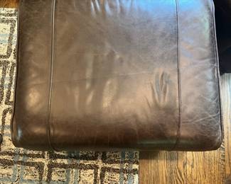 F24 - $400. Pottery Barn by Mitchell Gold Leather Chair & Ottoman. Measures 36" x 33.5" x 34" tall. Ottoman 25" x 20.5" x 14.75" tall.