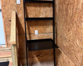 F60 - $65. Leaning Desk (I think it's Crate & Barrel Sloane). Measures 30" wide x 22.5" out from wall x 72" tall.