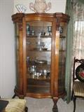 This is a gorgeous oak china cabinet; sadly with cracked glass on the front panel.