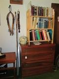 Horse hames, old razor strop, carved "Mountain Man" walking stick, entire book case is full of geneology books of several counties, etc.