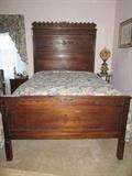Eastlake bed with high headboard 